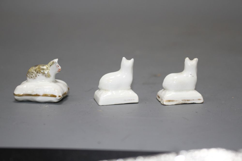 Three Staffordshire porcelain miniature models of recumbent kittens, c.1835-50, L. 2.6 - 3.2cm